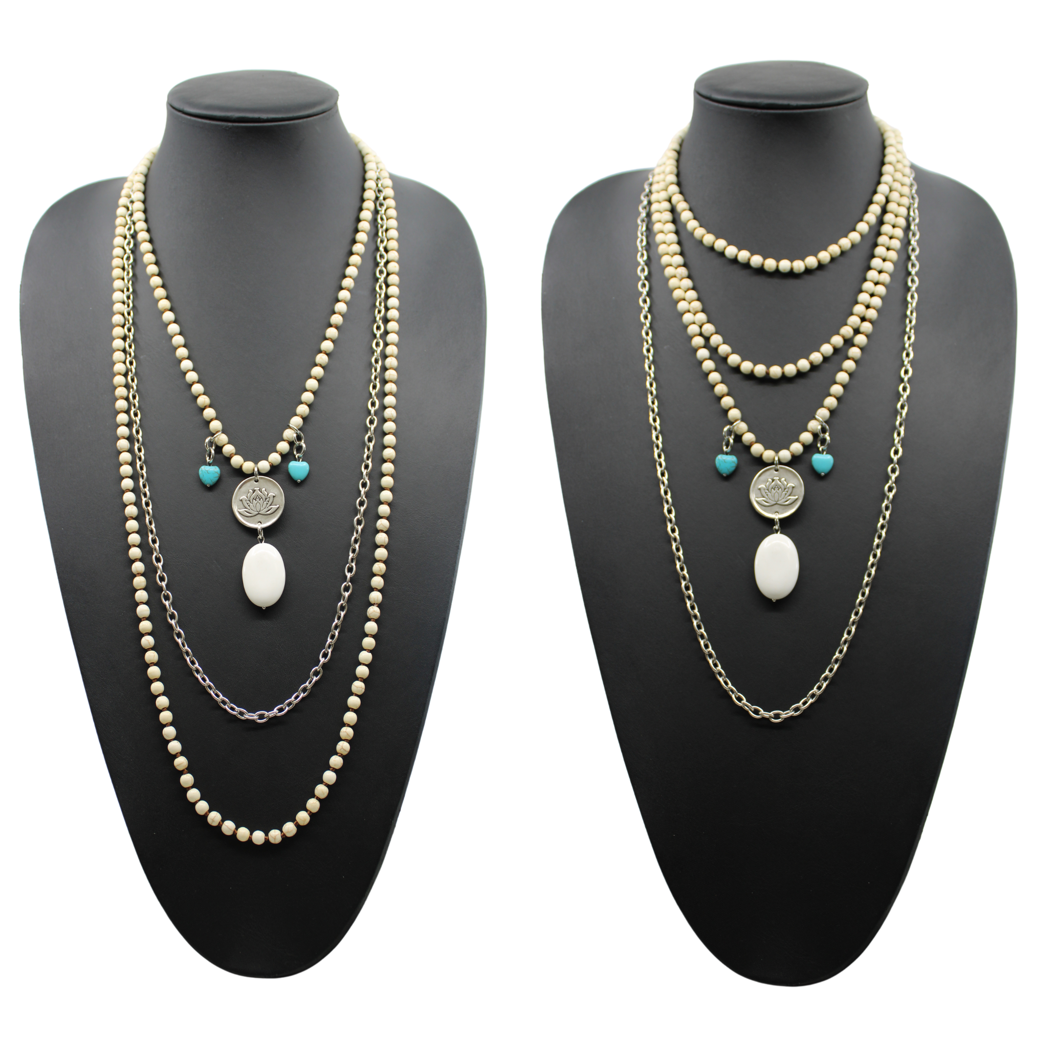 A person wearing a black shirt and showcasing a long gold chain necklace with off-white and blue howlite stones, along with matching bracelets and earrings.