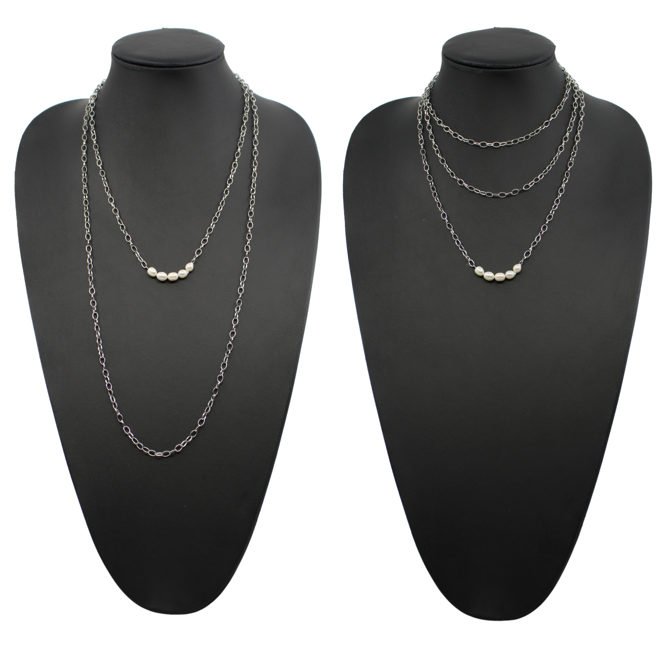 Two layering chain necklaces, one in gold finish and one in silver, each with pearl accent stones.