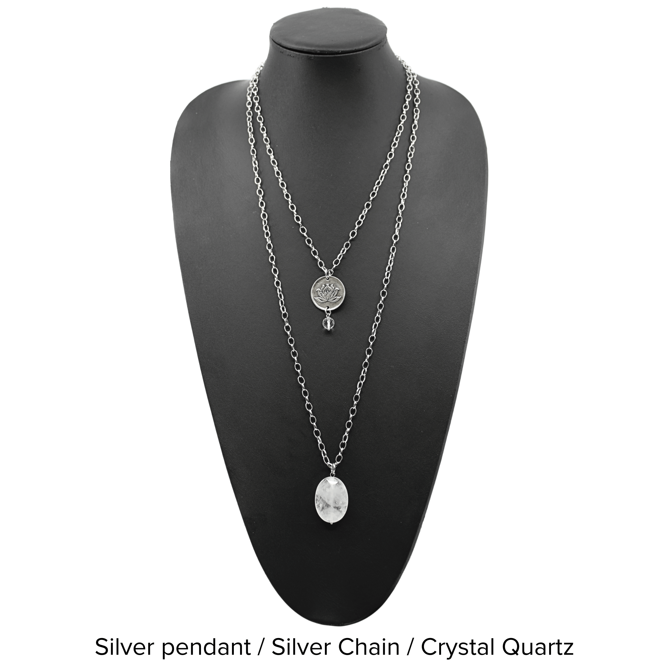 Two versions of the 'Just Breathe Lotus Original Necklace,' one with a gold finish and a lotus flower design, and another with a silver finish with the text 'JUST BREATHE' on it, both with beaded chains and a crystal accent.