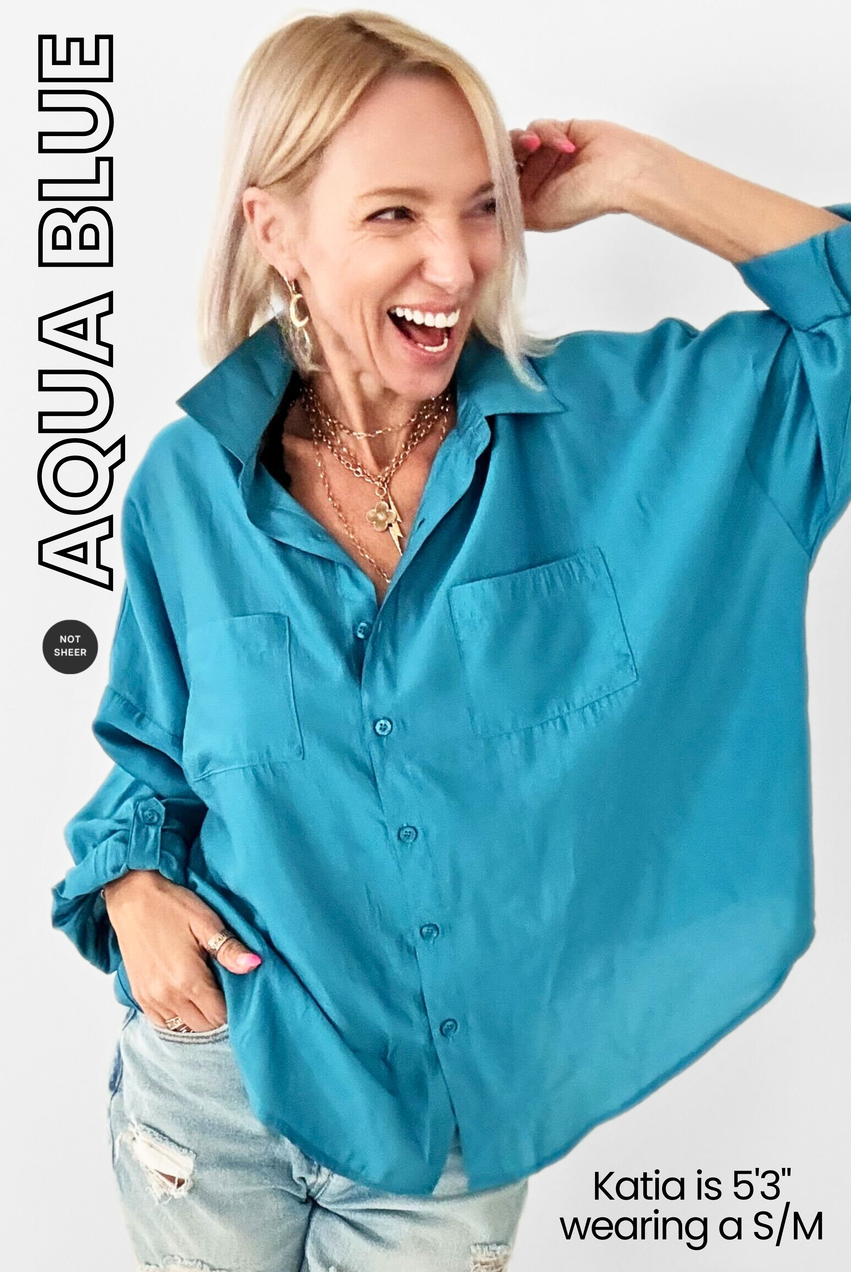 Woman wearing a blue shirt with 'Aqua Blue' text on a white background
