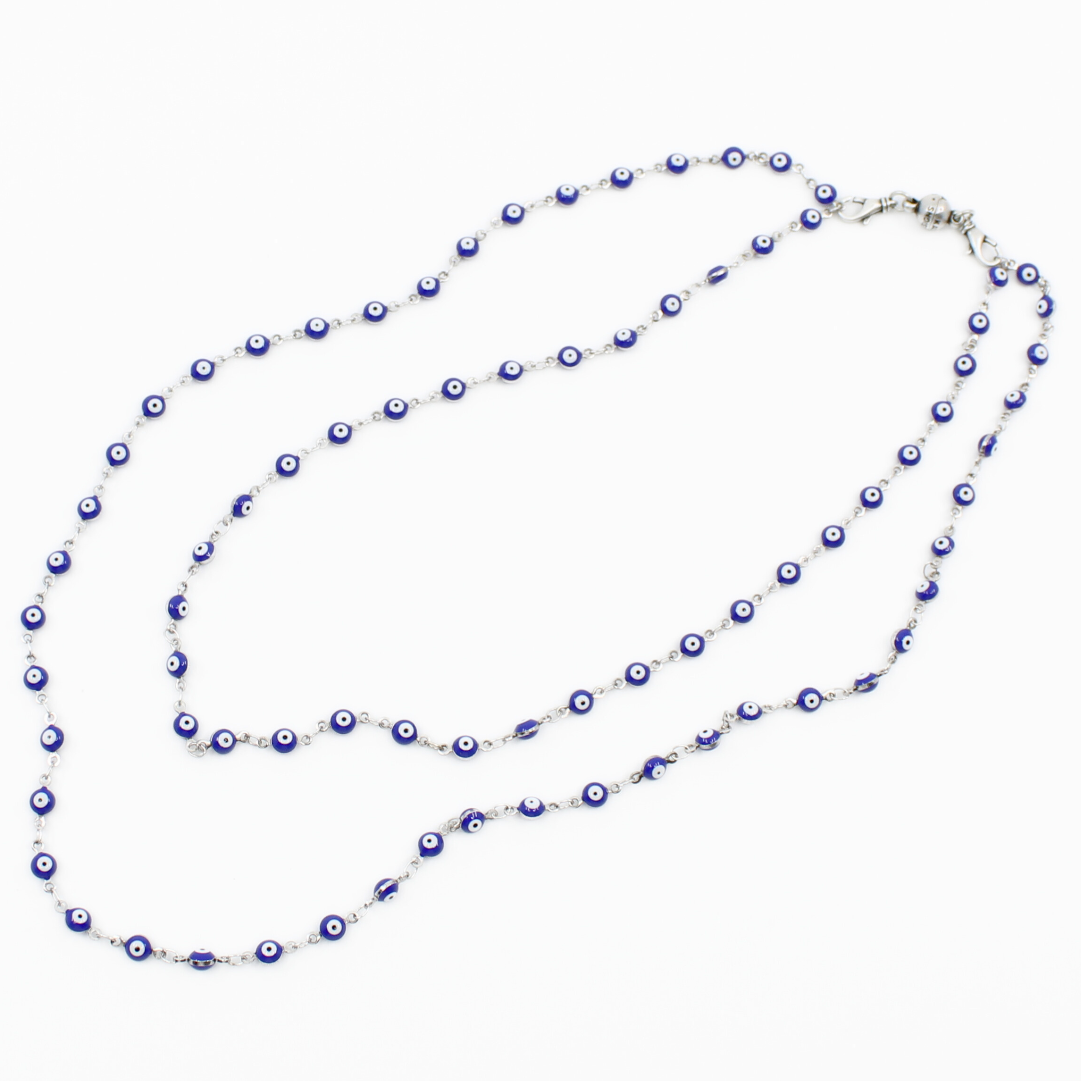 Necklace with blue and white beads on a white background