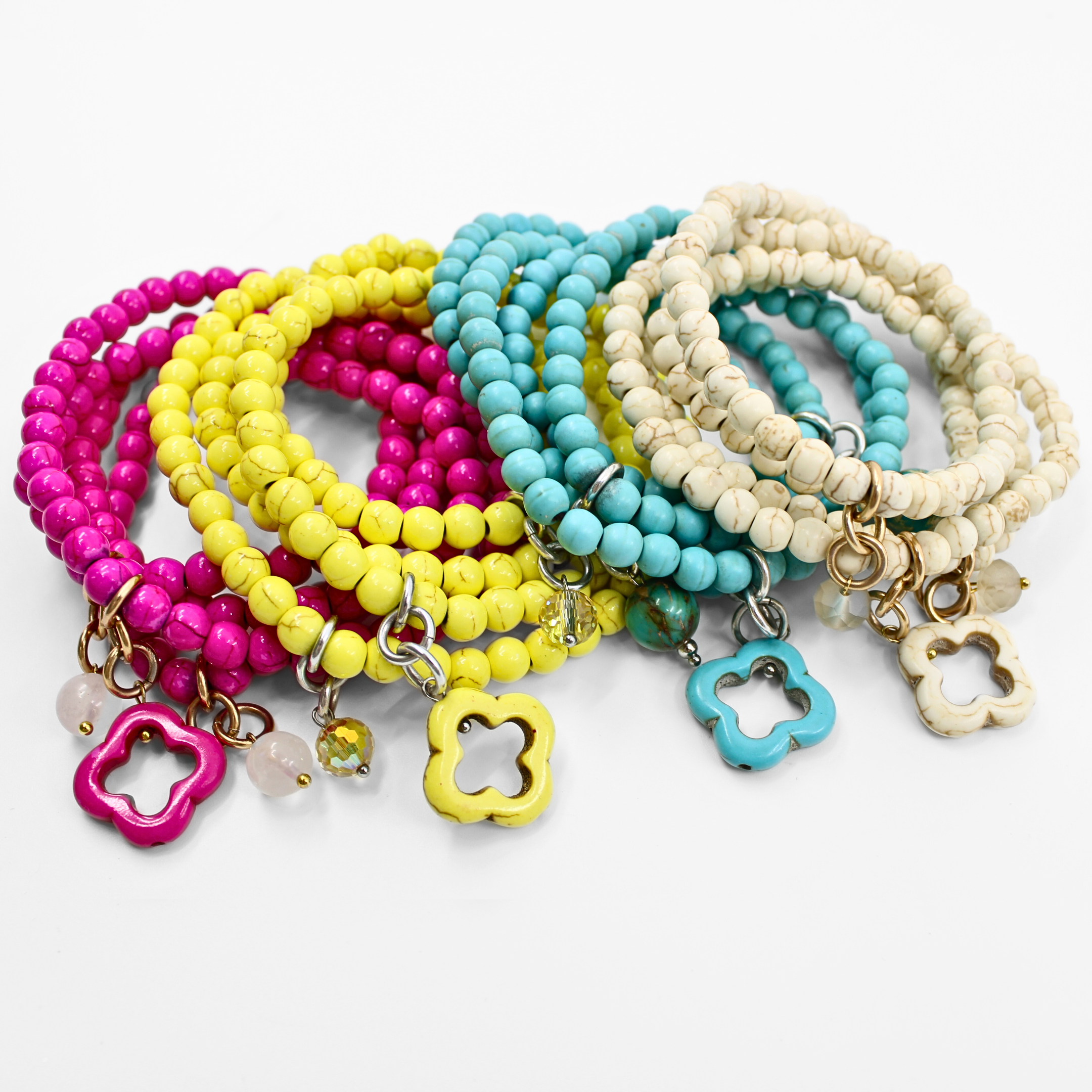 multiple colorful beaded boho wrap bracelets in 4 bright colors made with howlite beads