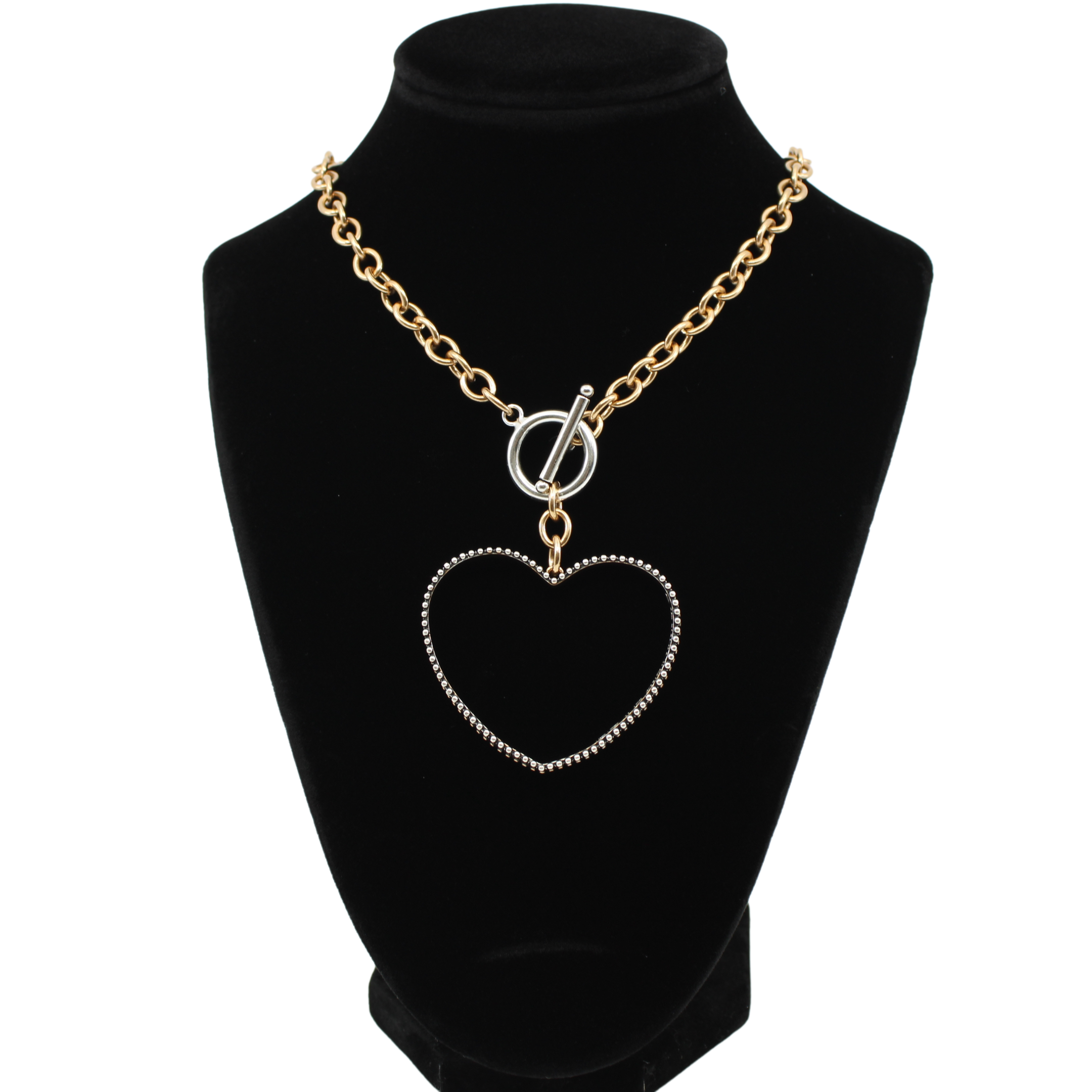 love always open heart mix metal statement choker necklace from katia designs. statement choker necklace adorned with a large hollow heart pendant, showcasing a two-tone design embellished trim and a heartfelt inscription. gold product variant pictured on display on velvet bust.