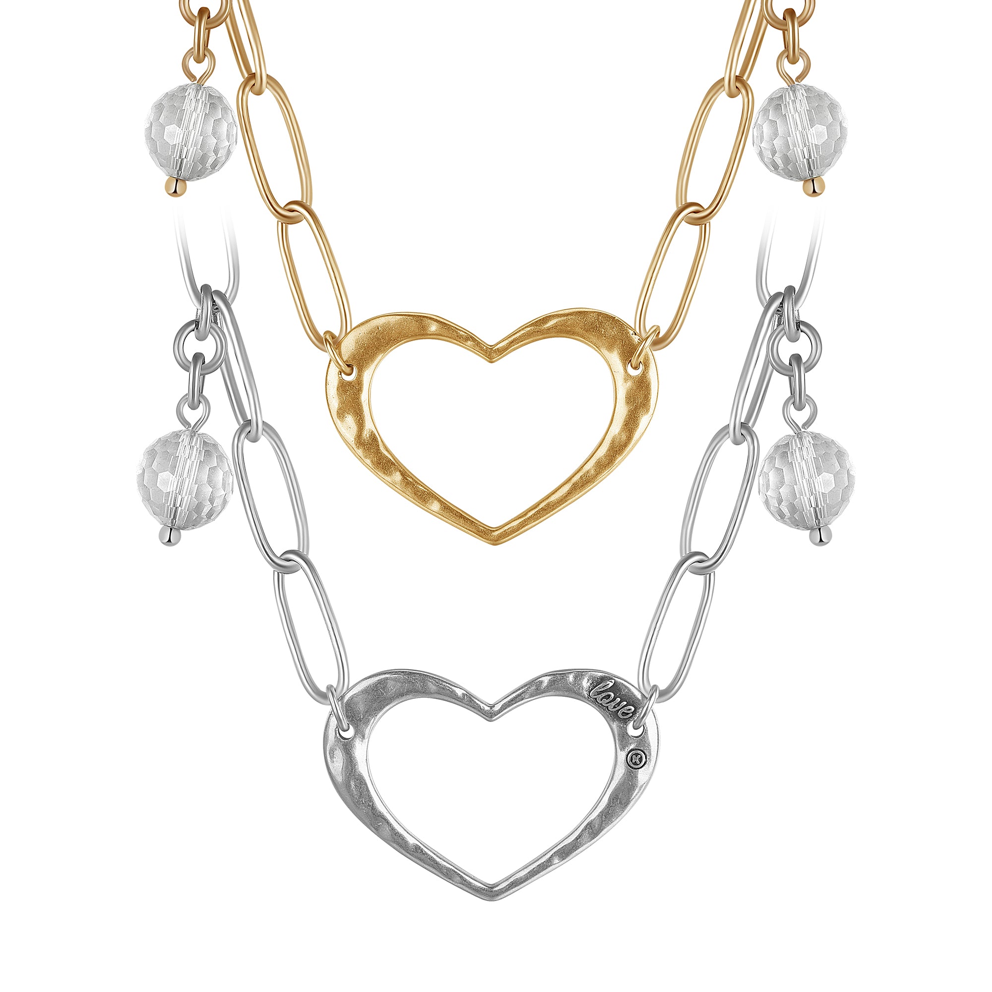 Two long chain necklaces with open heart pendants and crystal quartz accents, one with a gold-tone heart and clear quartz, and the other with a silver-tone heart and clear quartz.
