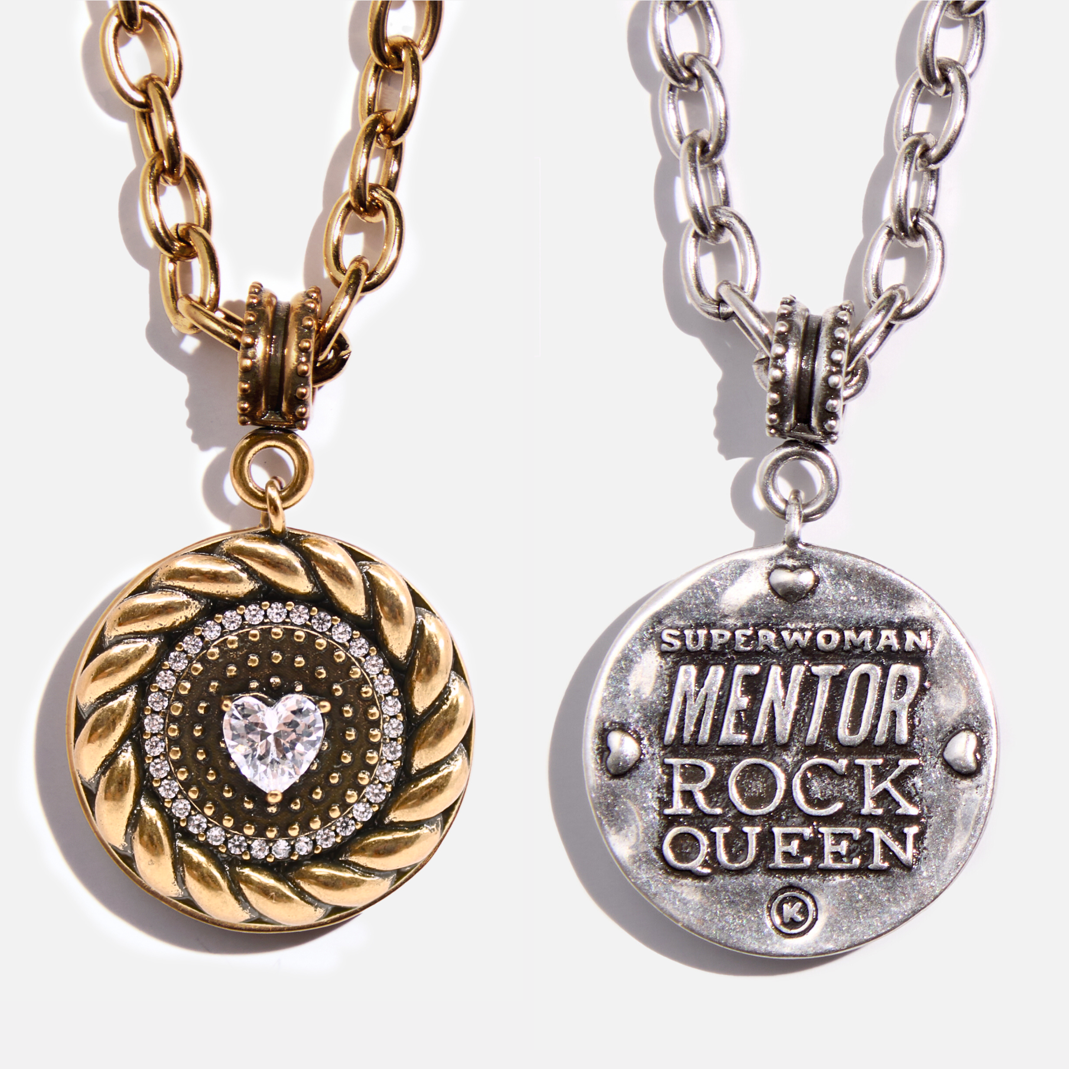 Two adjustable chain necklaces with circular pendants. One pendant has a crystal heart center and the other has 'SUPERMAN MENTOR ROCK QUEEN' inscribed.