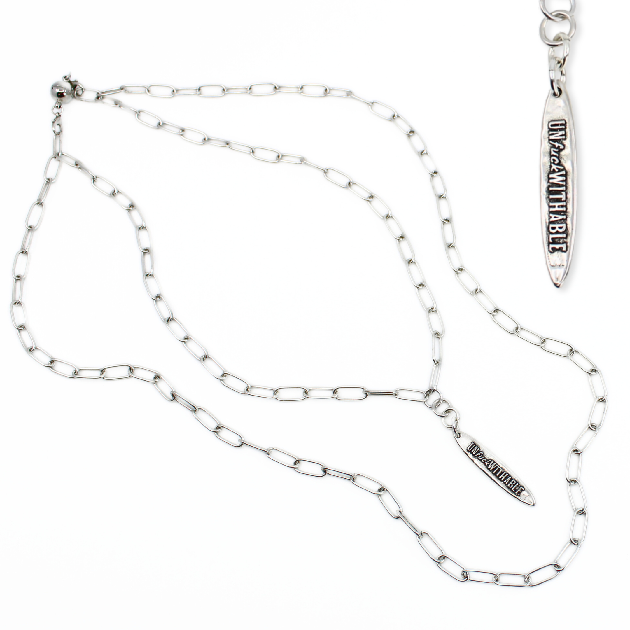 Silver chain necklace on a white background