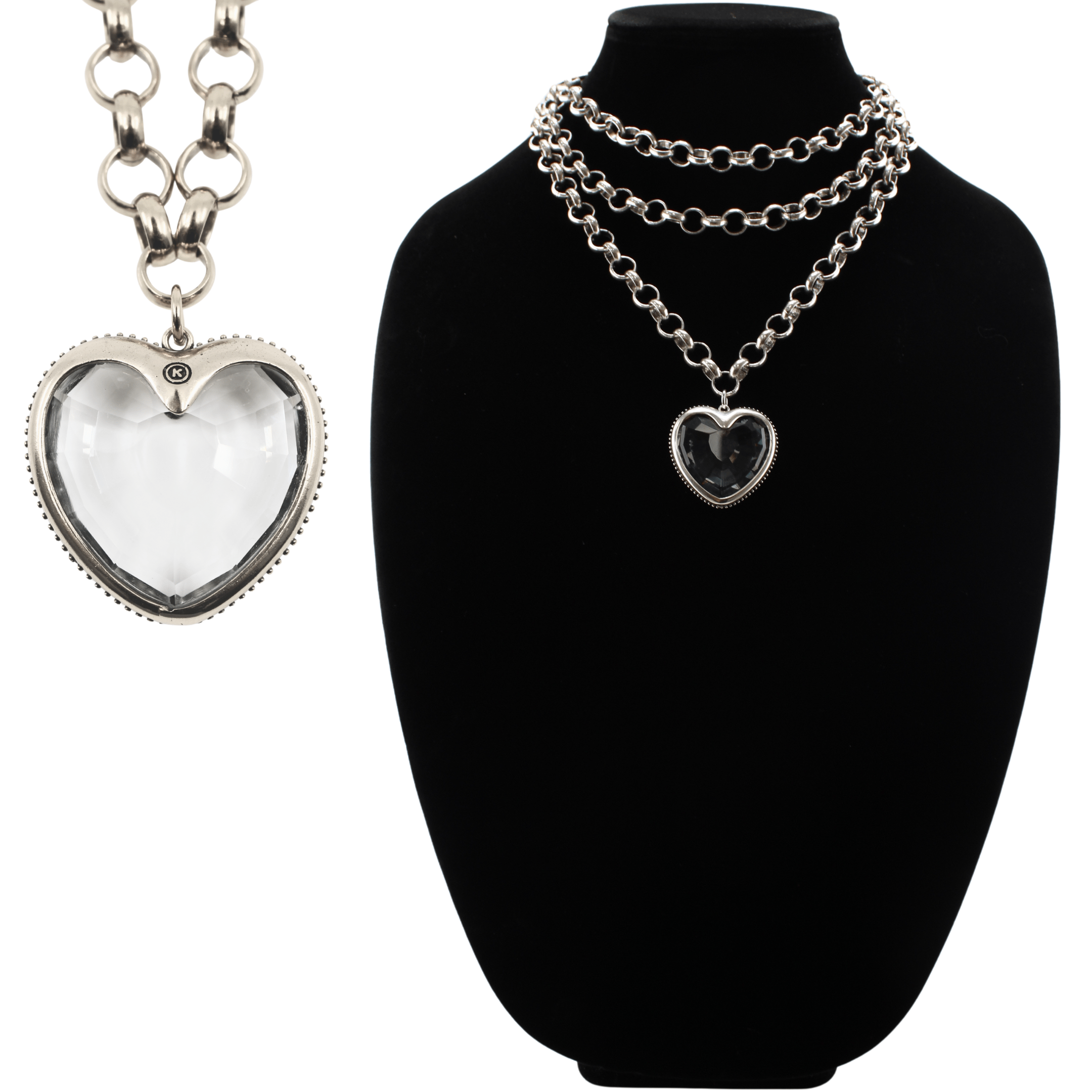 Silver chain necklace with heart-shaped pendant on a black stand, with another heart-shaped pendant on a chain on the left.