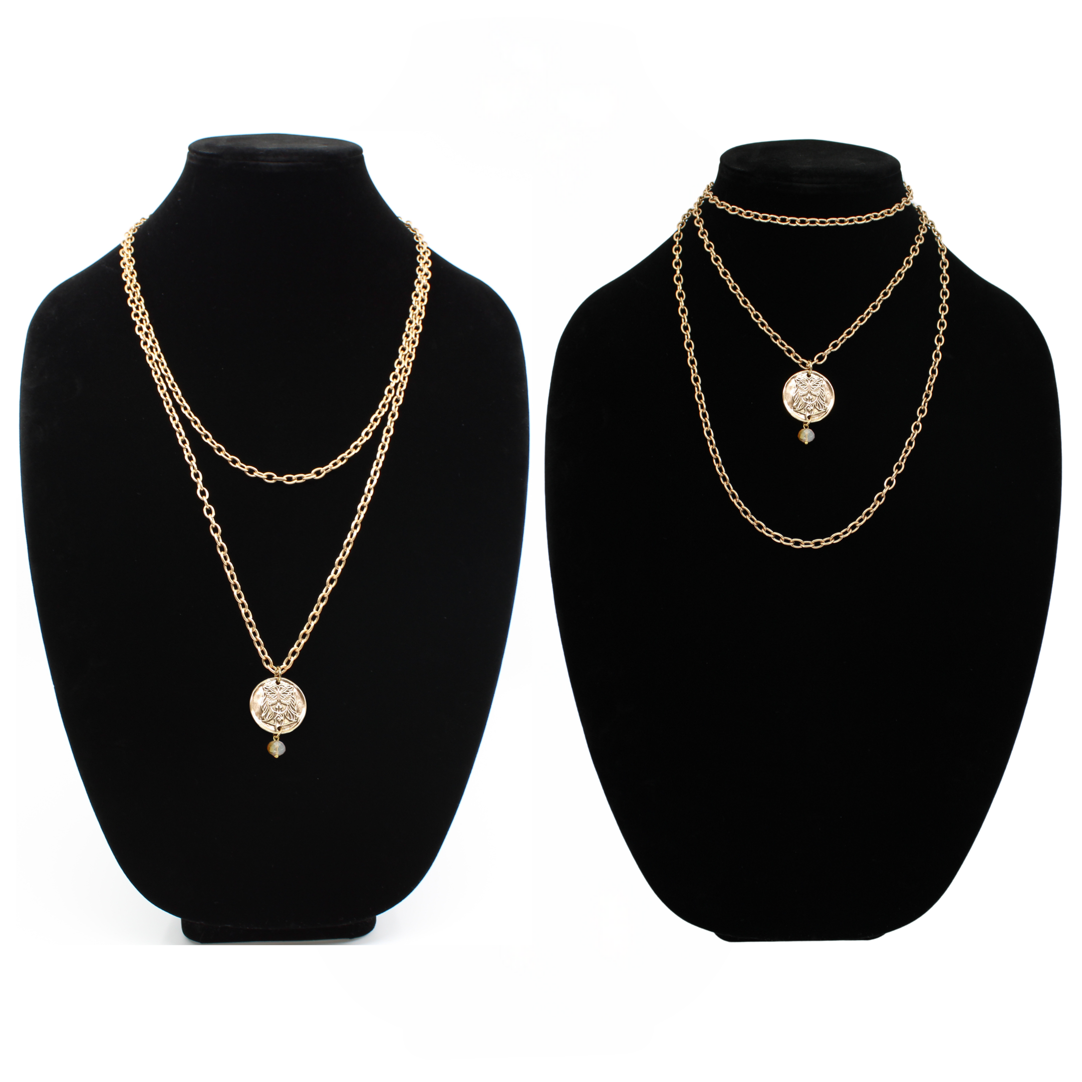 Two chain necklaces with round pendants: one gold with LISTEN adorned in plated brass and small beads, the other gold featuring a face design. Each piece exudes charm, enhanced by subtle crystal accents.