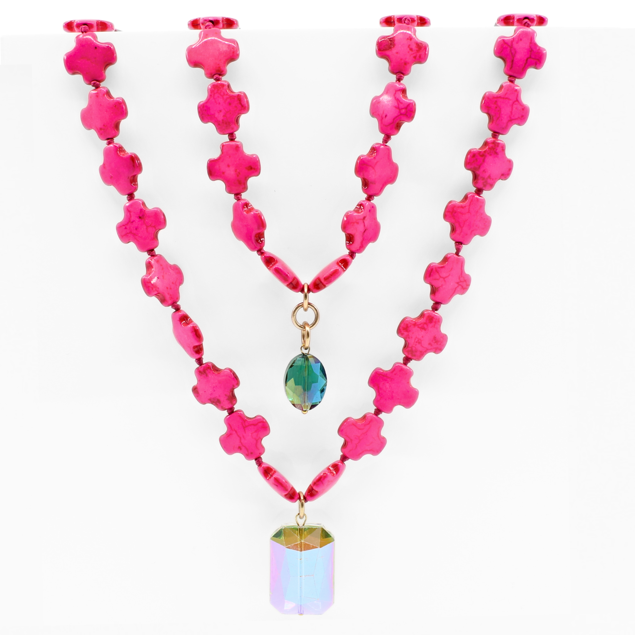 Hot Pink howlite beads
(1x) 18x26mm rectangular sunset crystal and (1x) 12x16mm teal AB crystal