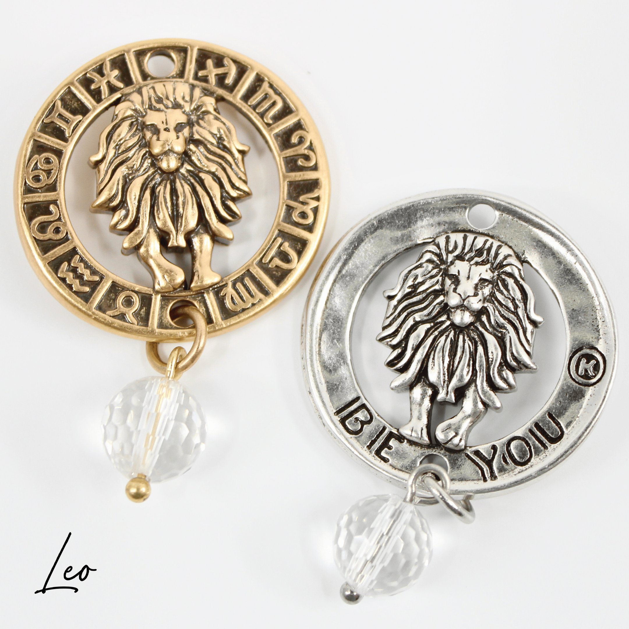 Two necklaces with gold and silver chains, featuring circular pendants with zodiac signs, and faceted crystal quartz accents.
