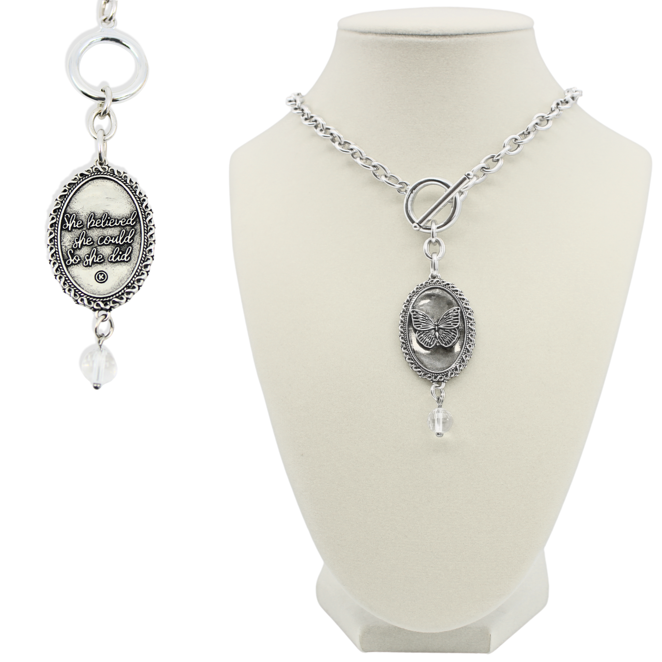 Silver necklace with pendant on a white mannequin bust