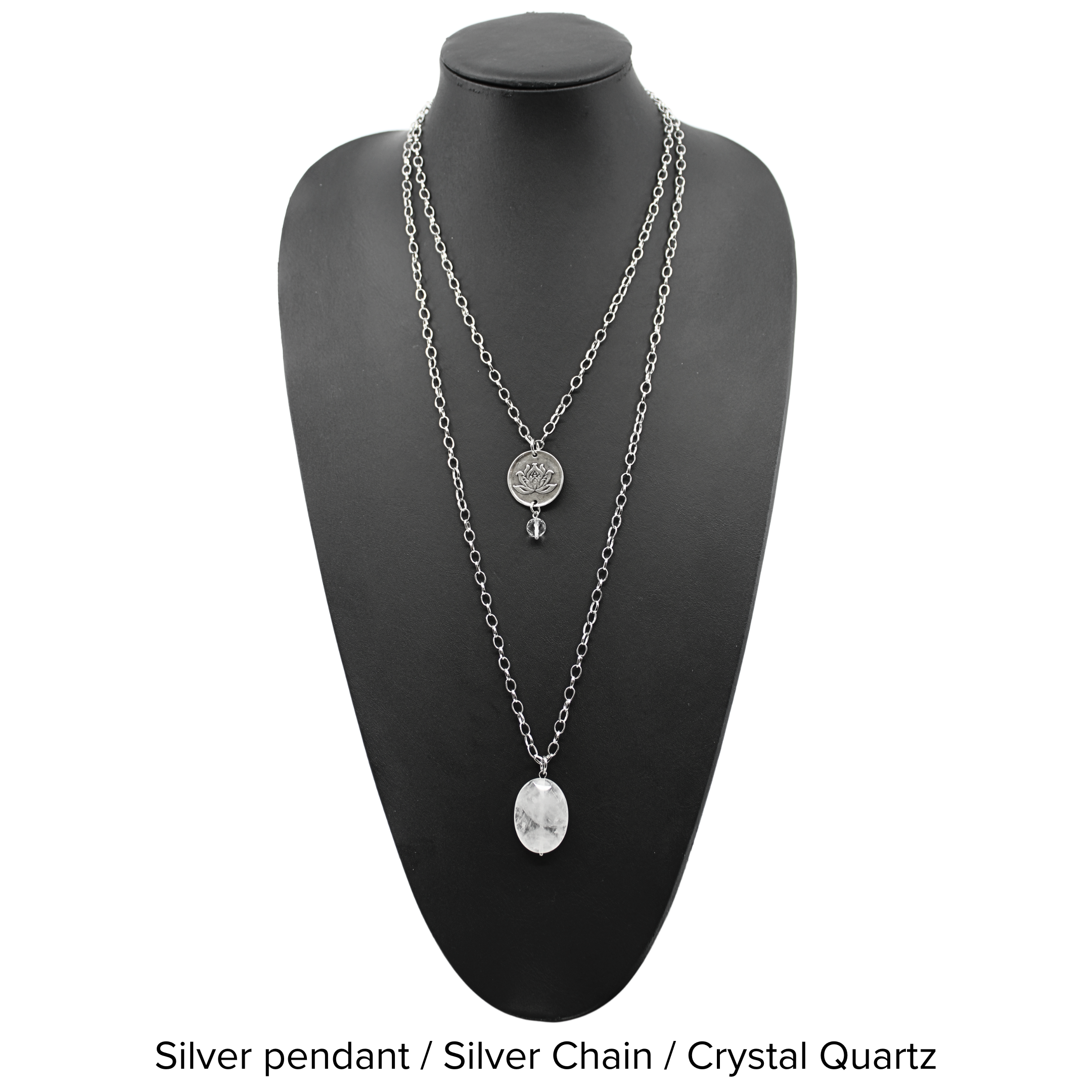 Two versions of the 'Just Breathe Lotus Original Necklace,' one with a gold finish and a lotus flower design, and another with a silver finish with the text 'JUST BREATHE' on it, both with beaded chains and a crystal accent.