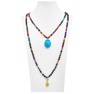Colorful beaded necklace with a blue pendant on a white mannequin.