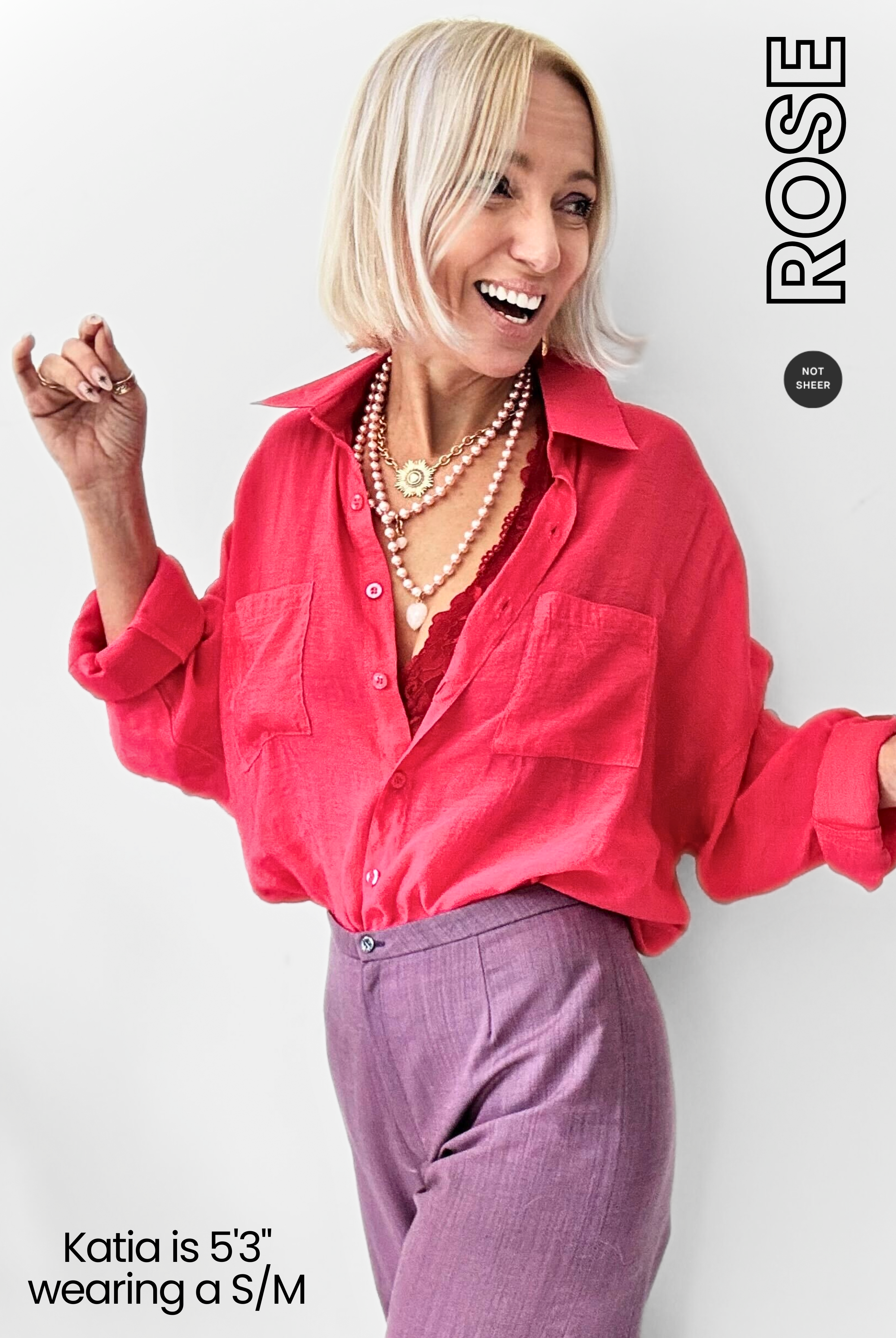 Woman wearing a red shirt and purple pants with 'ROSE' branding.