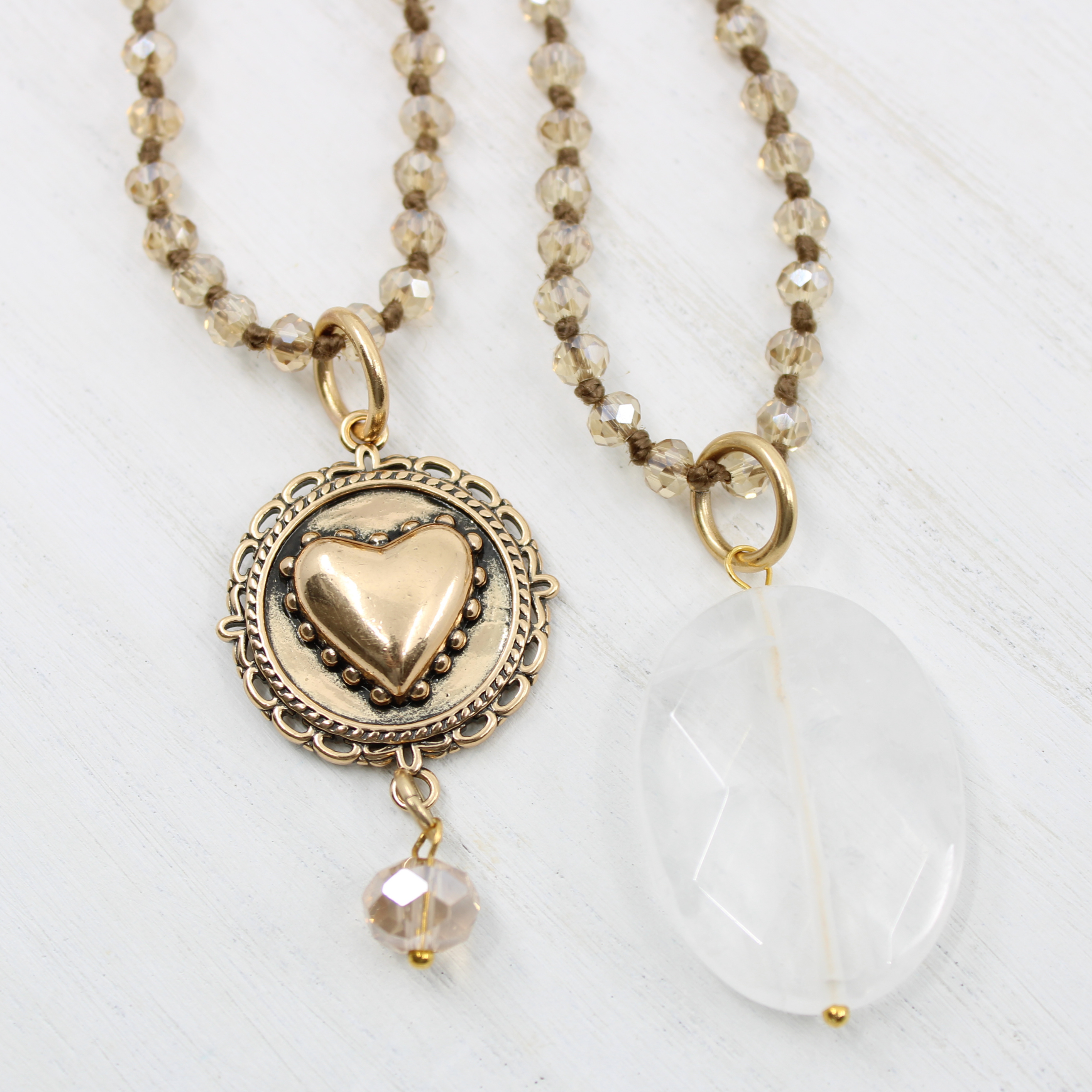 Alt Text: A collection of beaded necklaces with crystal elements, available in gold or silver finish, some with a 'I Am Enough' inscription.