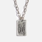 Silver necklace with a pendant on a white background