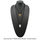 Two versions of the 'Just Breathe Lotus Original Necklace,' one with a gold finish and a lotus flower design, and another with a silver finish with the text 'JUST BREATHE' on it, both with beaded chains and a crystal accent.