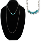 Turquoise beaded necklace on a black bust and additional turquoise beaded necklace on a white background.