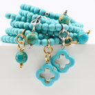 multiple colorful beaded boho wrap bracelets in 4 bright colors made with howlite beads. this image shows the turquoise blue one in both finish options