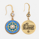 Pair of earrings with one blue and gold mandala design and the other 'I am ENOUGH' text on a white background