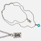 Necklace with motivational pendant on a white background