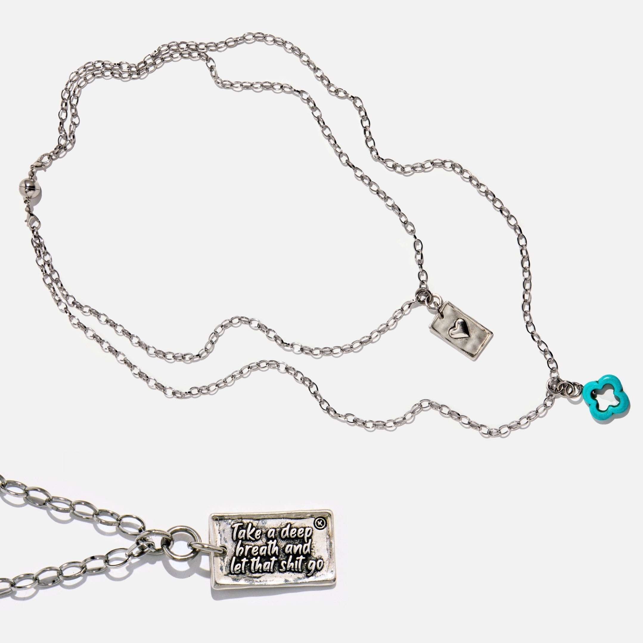 Necklace with motivational pendant on a white background