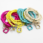 multiple colorful beaded boho wrap bracelets in 4 bright colors made with howlite beads