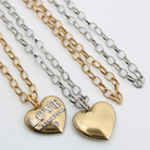 mixed metal chain necklace with heart pendant. 2 chain necklaces, featuring durable stainless steel, in gold or silver with 3D heart-shaped pendants. One side of pendant reads LOVE ALWAYS, while the other is smooth. The chains are beautifully displayed side by side.