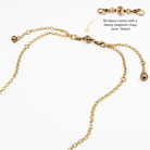 Gold necklace with magnetic clasp on a white background