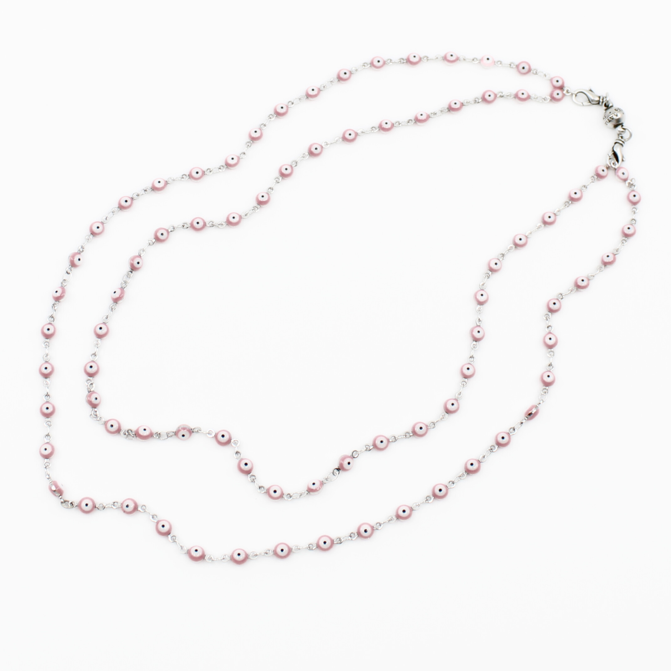 Pink pearl necklace on a white background