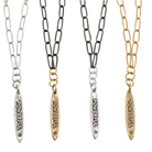Four necklaces with 'POWERFUL' pendants in different metals on a white background