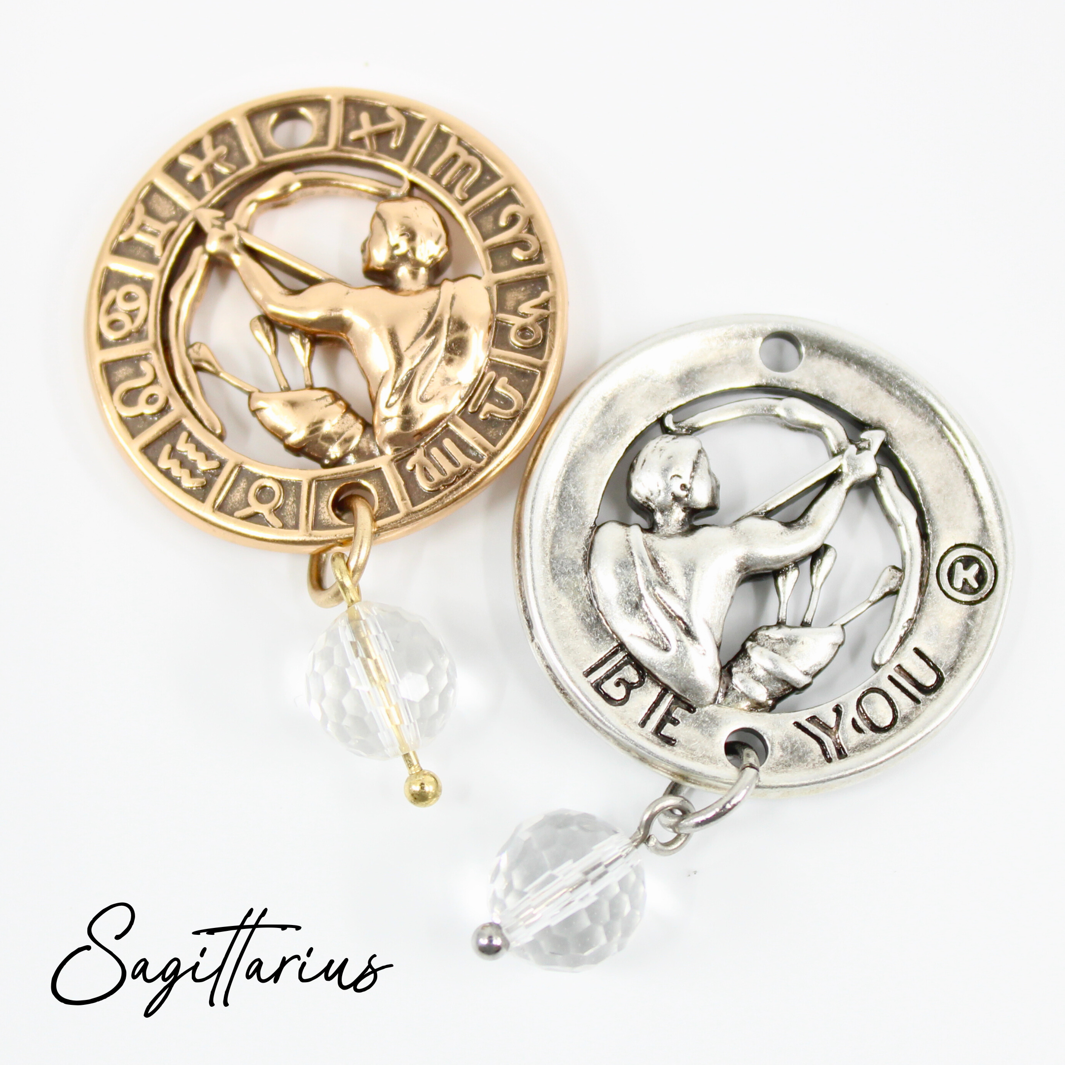 Two necklaces with gold and silver chains, featuring circular pendants with zodiac signs, and faceted crystal quartz accents.