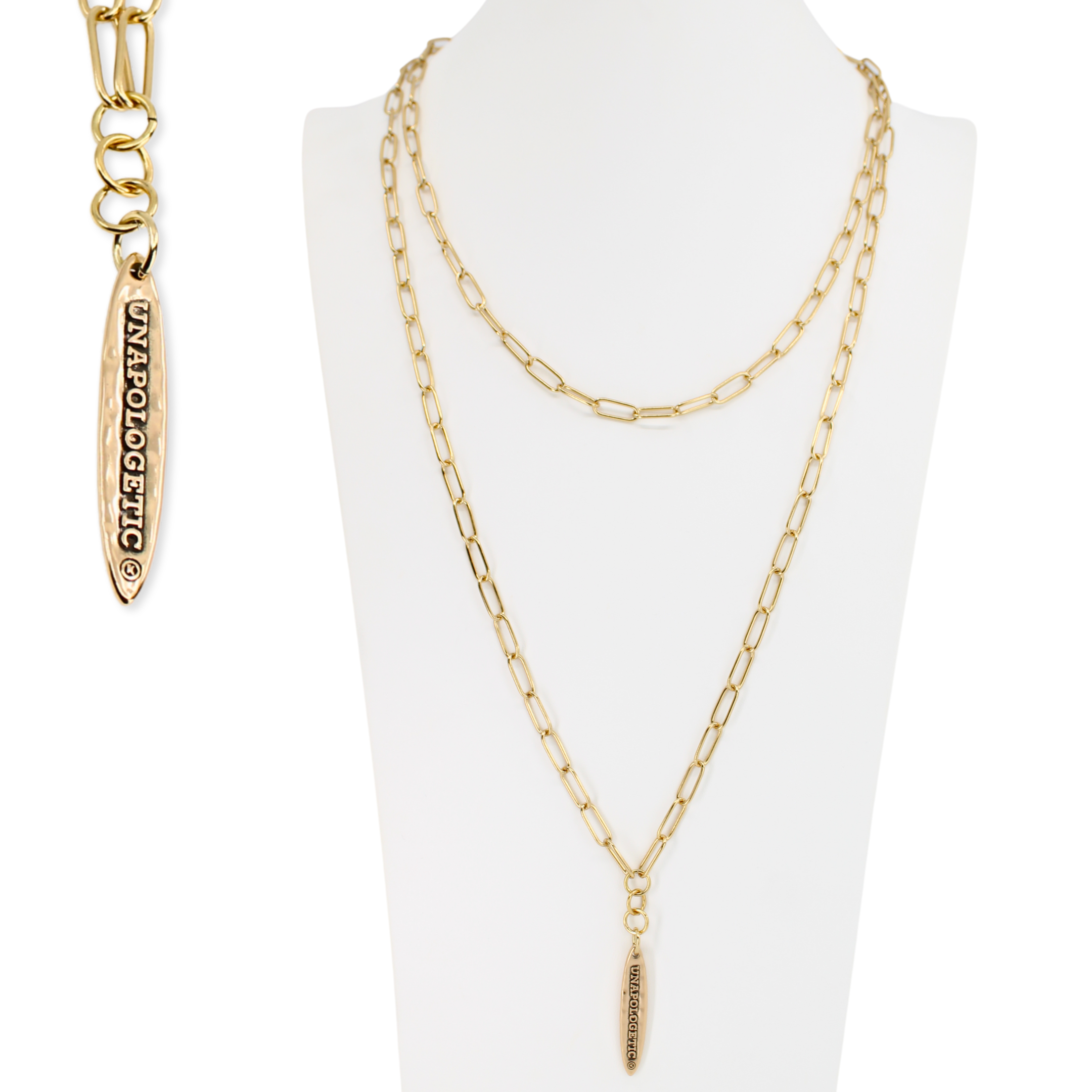Gold chain necklace and bracelet on a white mannequin bust