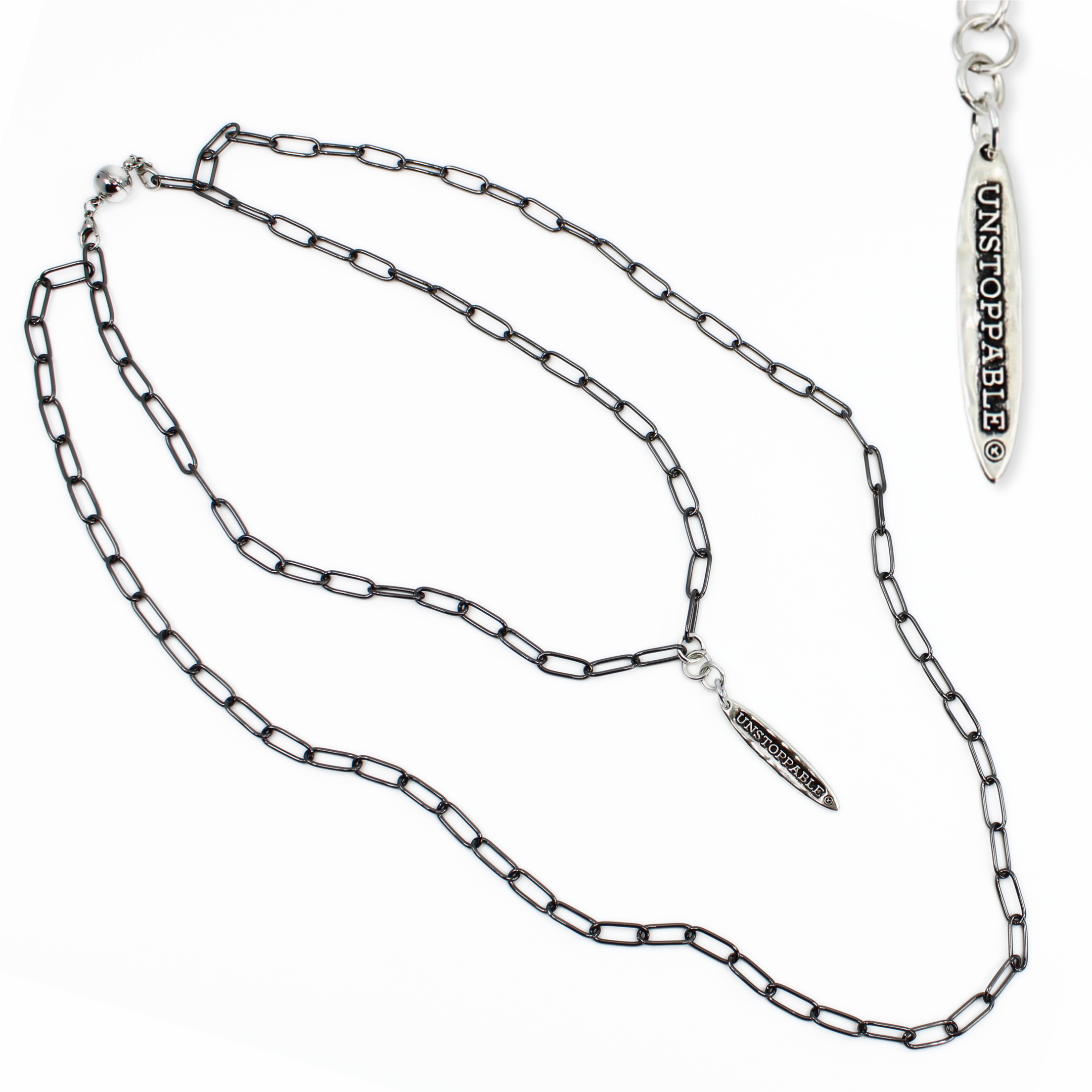 Silver chain necklace on a white background