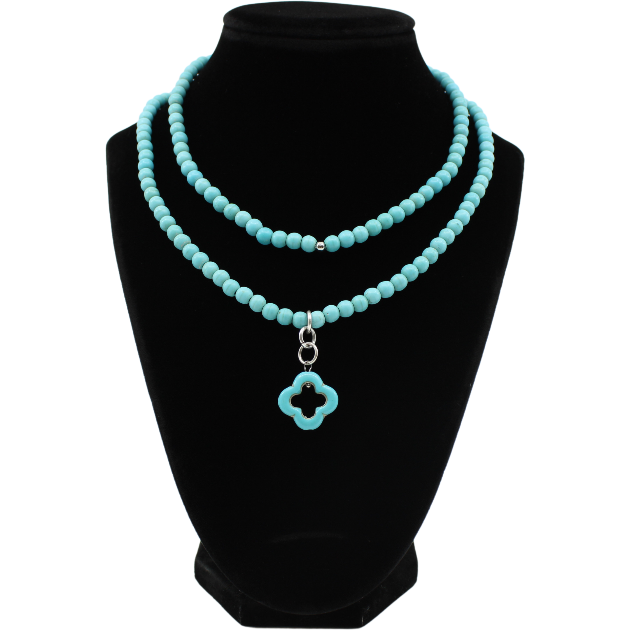 multiple colorful beaded boho wrap bracelets in 4 bright colors made with howlite beads. this image shows the turquoise blue one on a black bust worn as a necklace