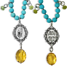 Two beaded necklaces with pendants on a white background