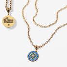 Two gold necklaces with pendants on a white background