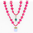 Hot Pink howlite beads
(1x) 18x26mm rectangular sunset crystal and (1x) 12x16mm teal AB crystal