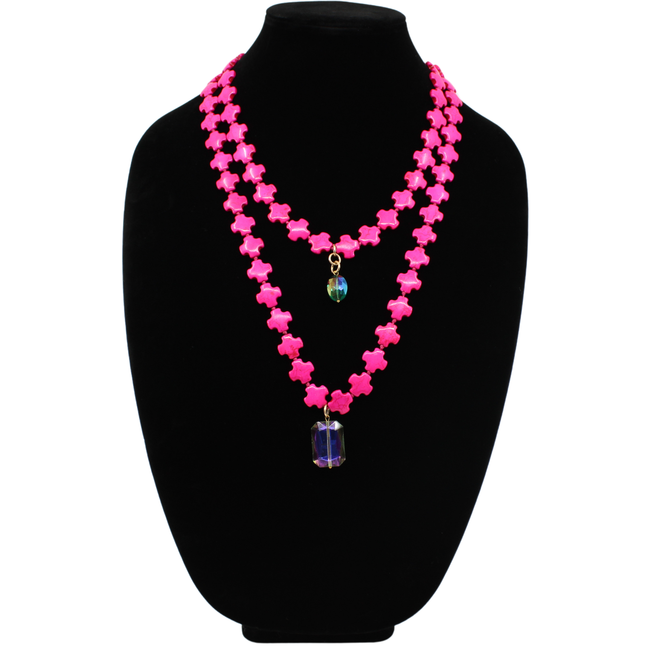 Hot Pink howlite beads
(1x) 18x26mm rectangular sunset crystal and (1x) 12x16mm teal AB crystal displayed on black velvet bust