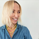 katia wearing the yellow ad necklace