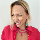 katia wearing pink necklace