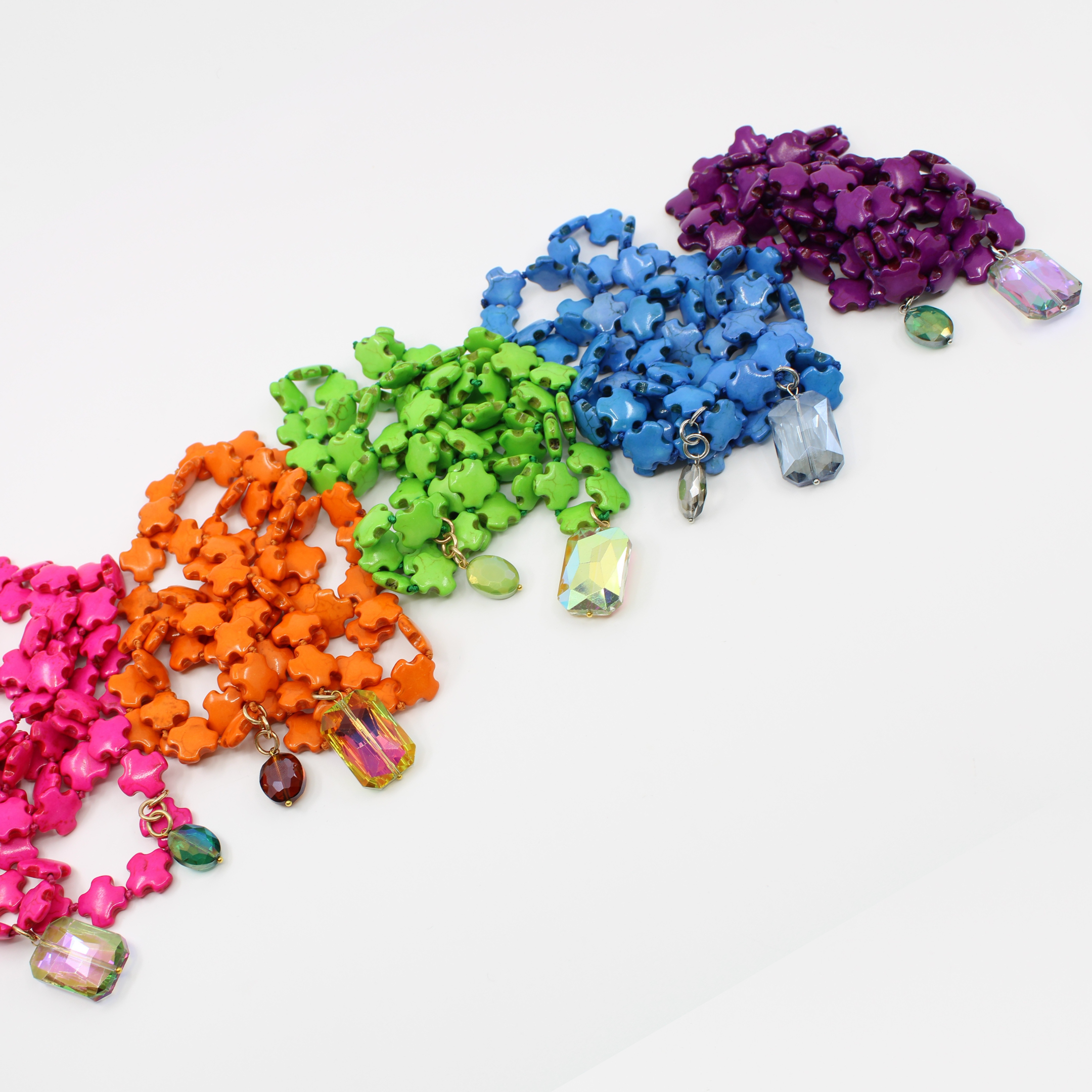 47" 15mm square-cross Howlite bead necklace with 2 faceted crystal accent stones. Choose from 5 colors.