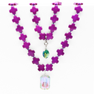 Magenta Purple howlite beads
(1x) 18x26mm rectangular sunset crystal and (1x) 12x16mm teal AB crystal