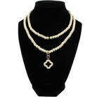 multiple colorful beaded boho wrap bracelets in 4 bright colors made with howlite beads. this image shows the off-white one on a black bust worn as a necklace