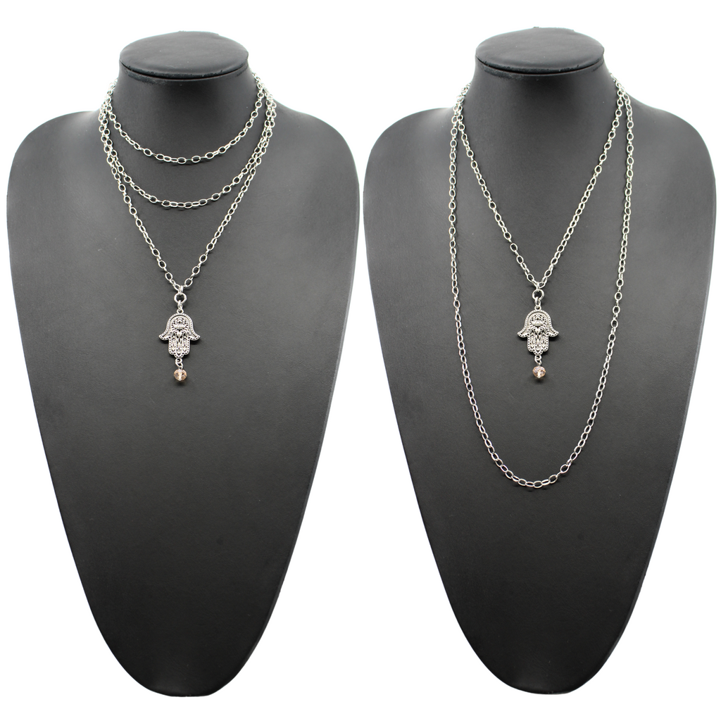 silver original chain and pendant worn 2 ways on black bust