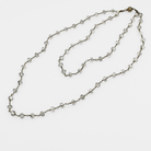 Necklace with clear beads on a white background