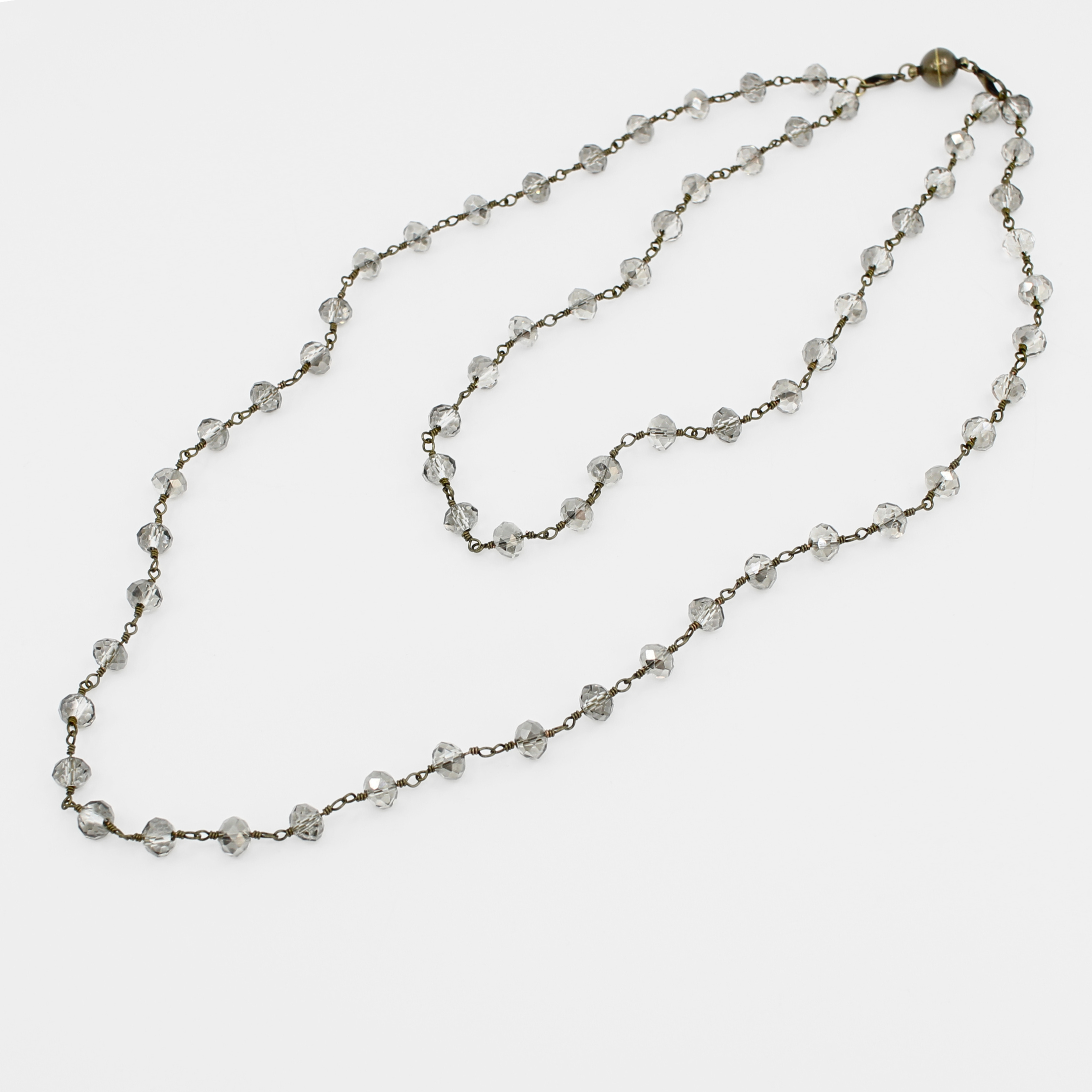 Necklace with clear beads on a white background